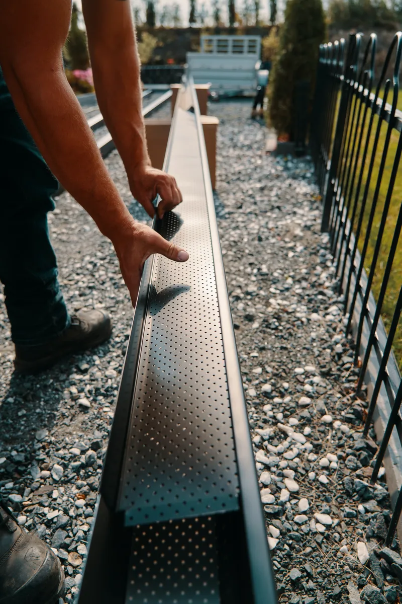 Seamless gutter installation from the ladder — Gutter Guys, Northeastern South Dakota BC